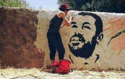 رسم صورة للزفزافي على حائط يقود رساما للاعتقال